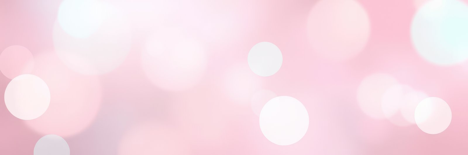 Soft pink bokeh lights create a dreamy atmosphere for events and celebrations in an elegant setting